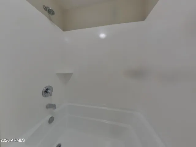 a bathroom with a sink a vanity and a mirror