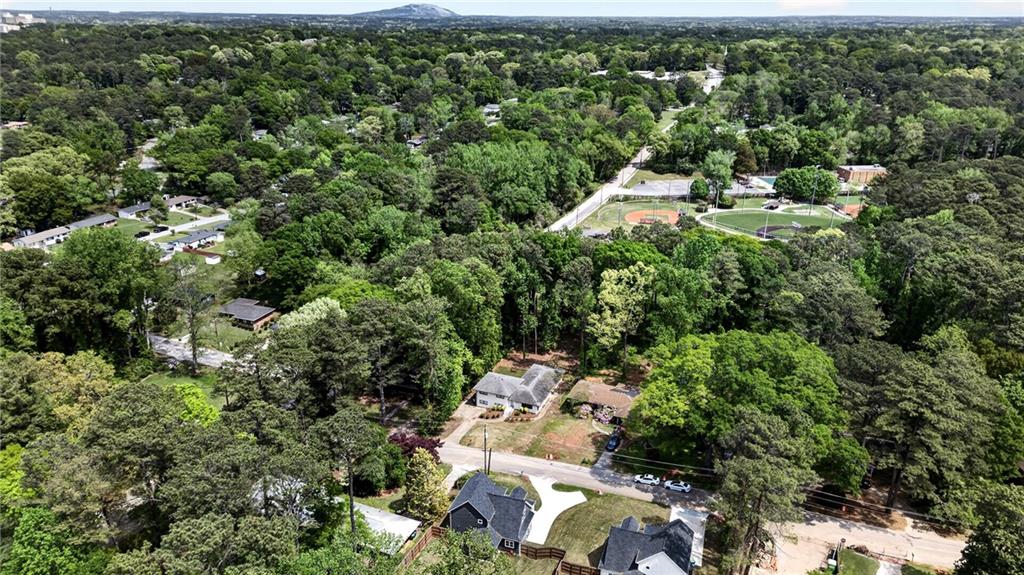 1344 Midlawn Drive Decatur, GA 30032 - Photo 69 of 87 an aerial view of residential house with outdoor space and trees all around