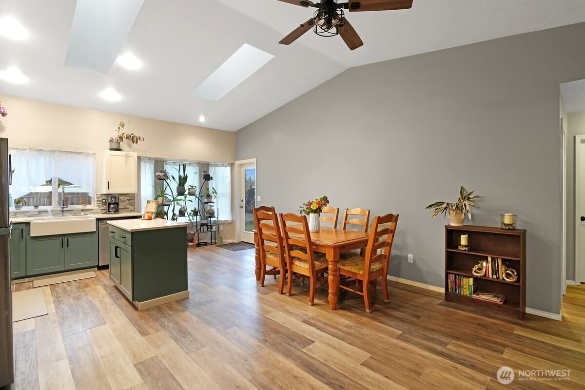 25 Clemons Road Montesano, WA 98563 - Photo 9 of 32 a view of a dining room with furniture and wooden floor