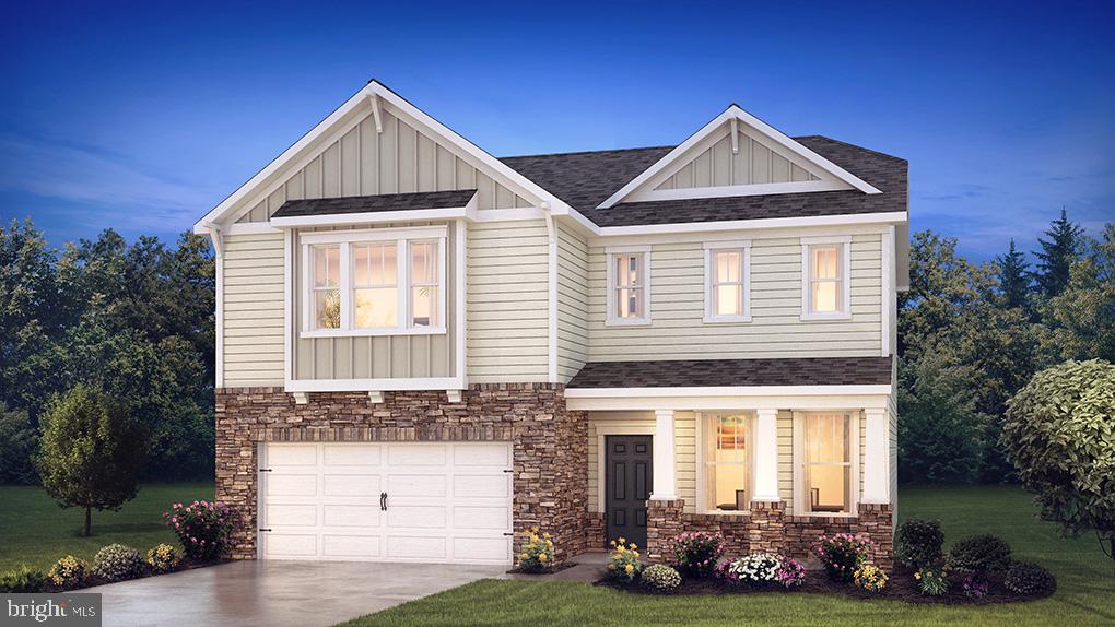 121 Winding Road Easton, PA 18040 - Photo 2 of 24 a front view of a house with a yard