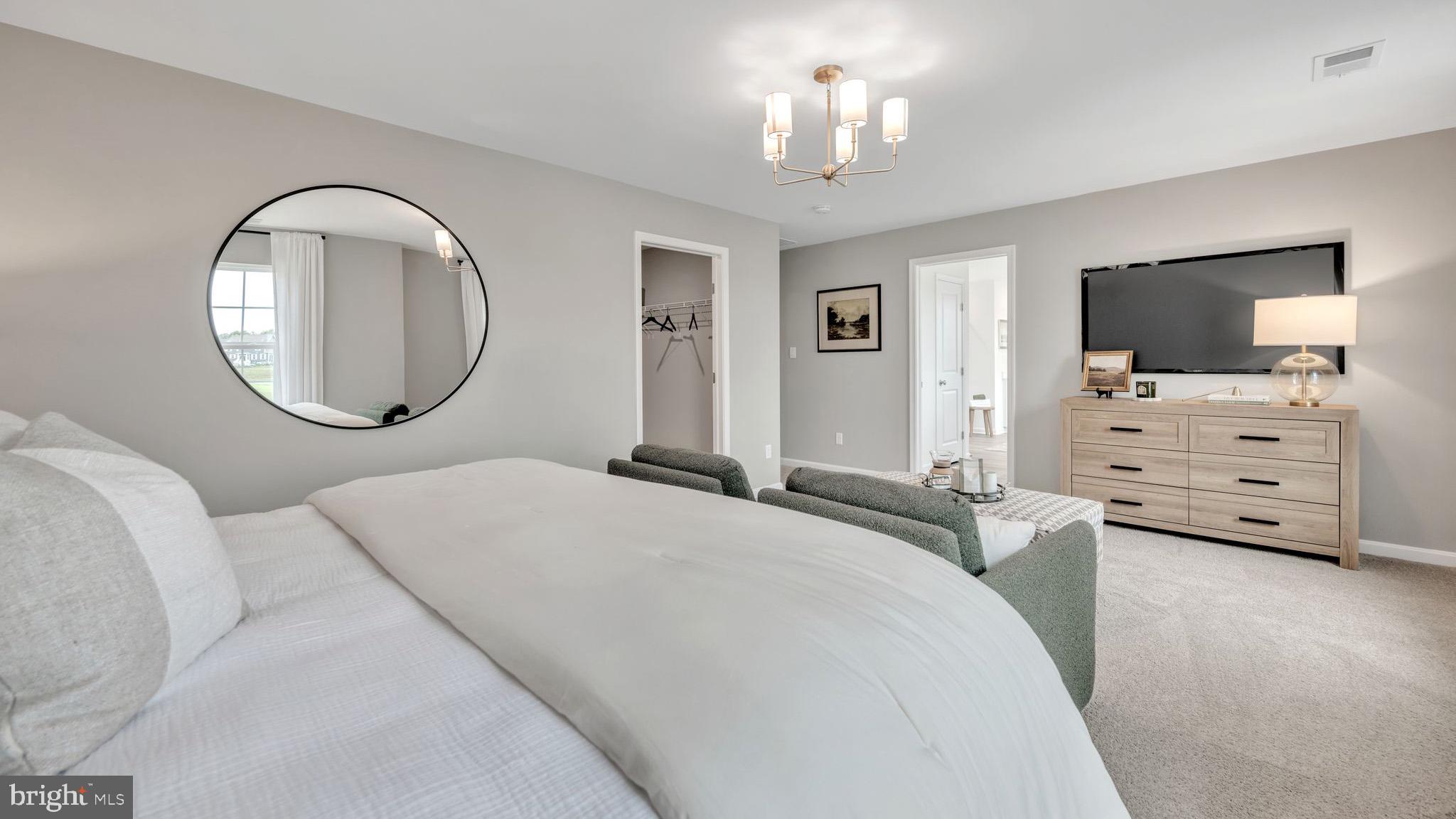 121 Winding Road Easton, PA 18040 - Photo 23 of 24 a bedroom with a bed and a flat screen tv