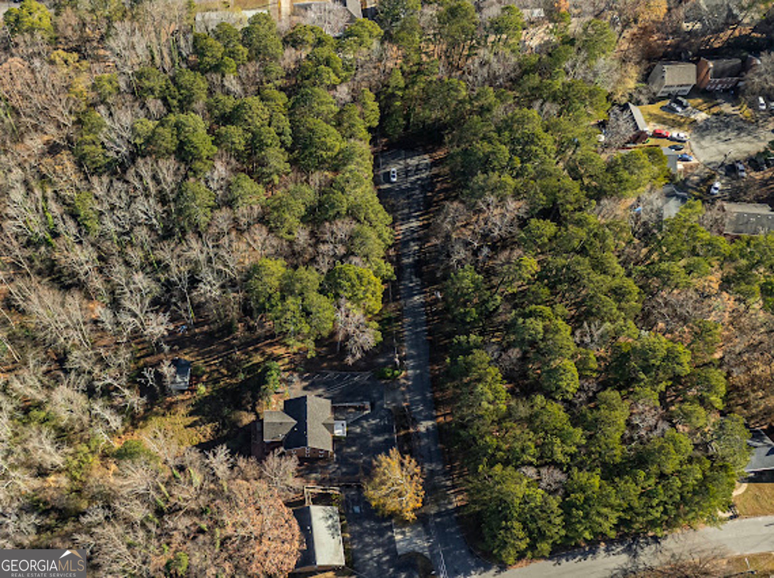 4958 Presidents Way Tucker, GA 30084 - Photo 2 of 6 a view of a tree in a forest