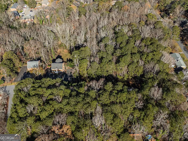 a view of a house with a tree
