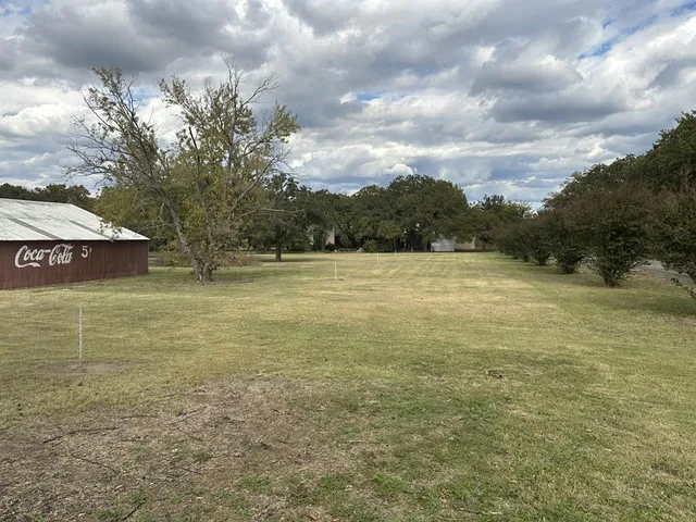 a view of empty room with windows