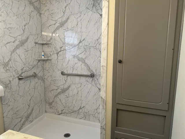 a view of empty room with windows