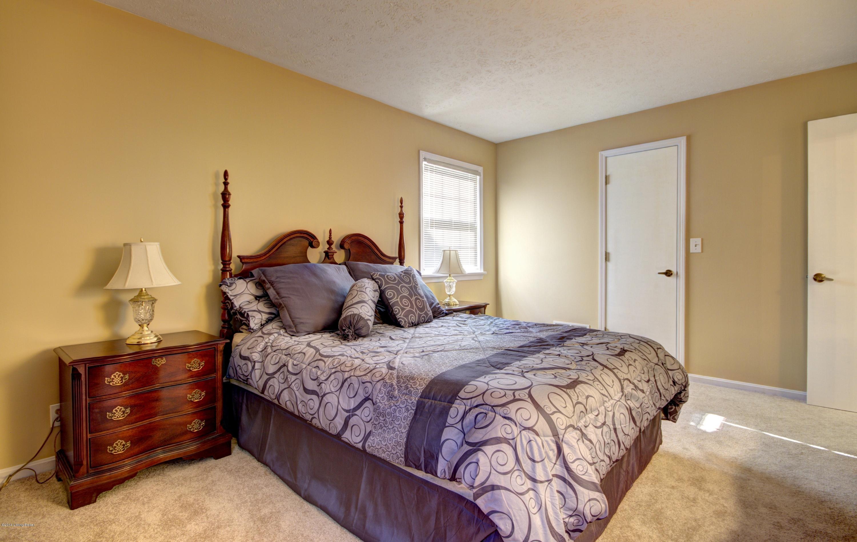 7602 Tempsclair Road Louisville, KY 40220 - Photo 7 of 44 The 1st floor master bedroom has a big walk-in closet.