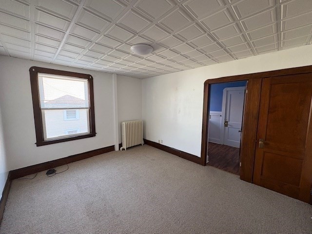 967 Robeson Street, Unit 2 Fall River, MA 02720 - Photo 14 of 15 an empty room with windows