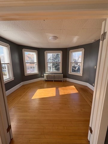 967 Robeson Street, Unit 2 Fall River, MA 02720 - Photo 4 of 15 a view of empty room with window