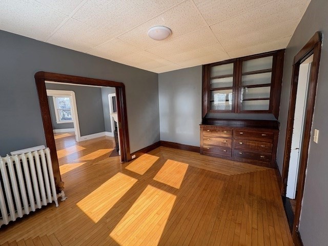 967 Robeson Street, Unit 2 Fall River, MA 02720 - Photo 7 of 15 a view of hallway with wooden floor and furniture