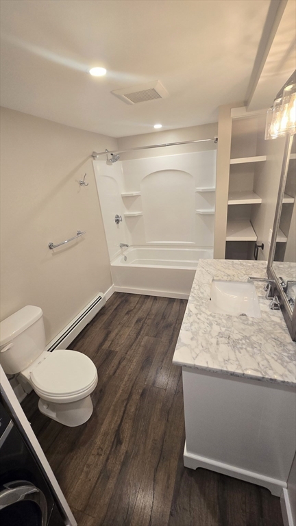 15 Central Street, Unit 4 Georgetown, MA 01833 - Photo 10 of 24 a bathroom with a granite countertop toilet and a sink