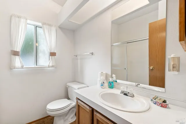 a bathroom with a sink and a toilet