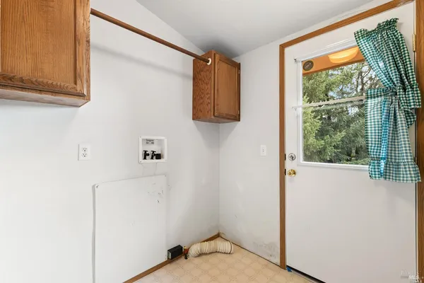 a view of walk in closet with window