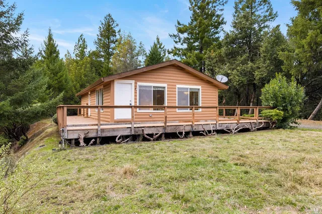 a view of backyard with green space