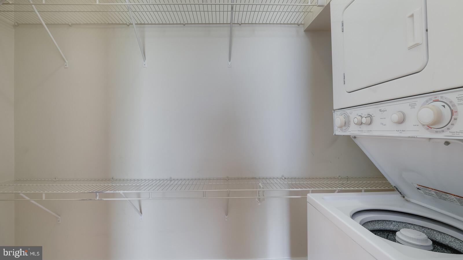 22 North Main Street, Unit 3 Doylestown, PA 18901 - Photo 16 of 18 a utility room with dryer and washer