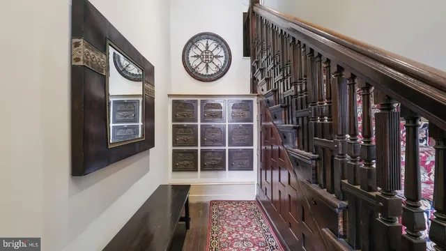 a view of a hallway with wooden door