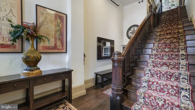 a view of entryway with wooden floor