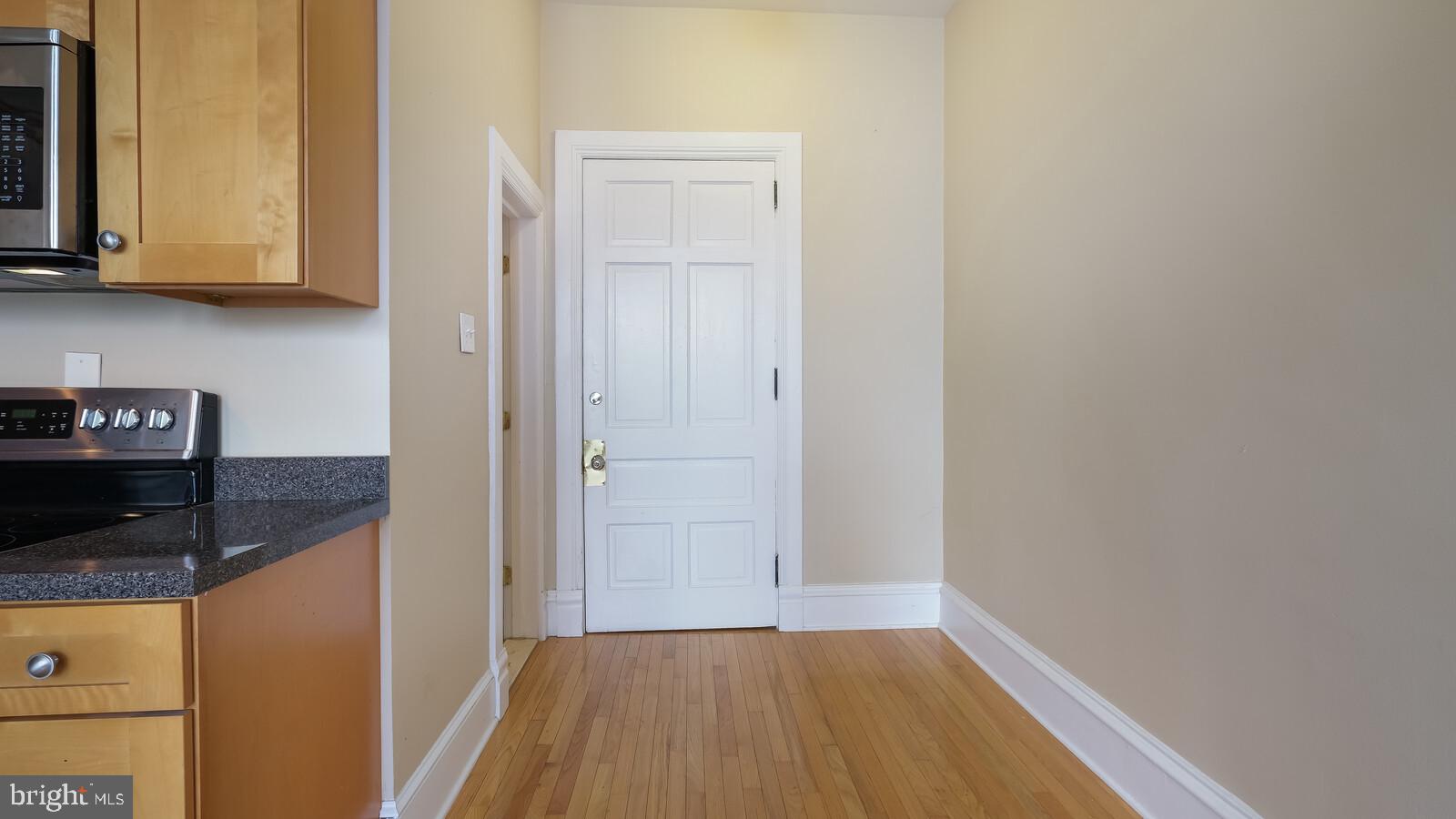 22 North Main Street, Unit 3 Doylestown, PA 18901 - Photo 7 of 18 a view of a kitchen from the hallway