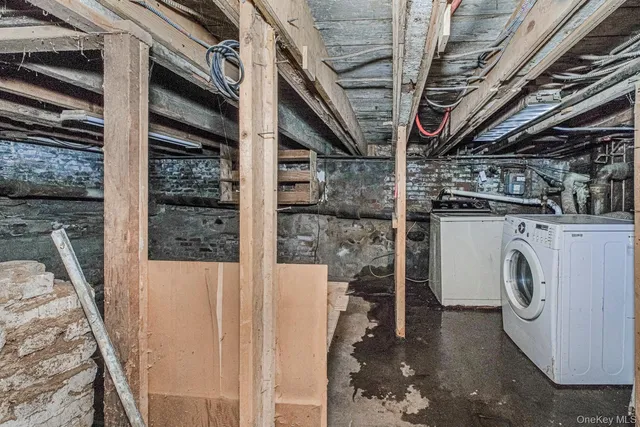 a front view of a house with parking space