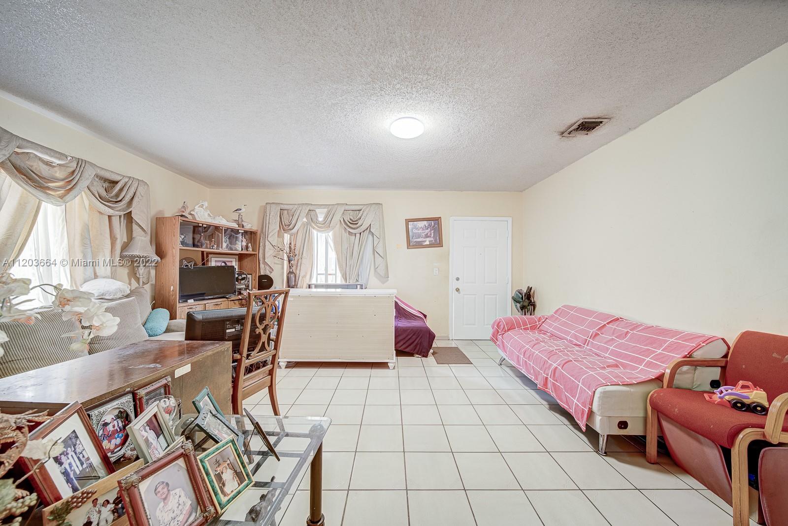 1920 Southwest 4th Street Miami, FL 33135 - Photo 17 of 28 a living room with furniture