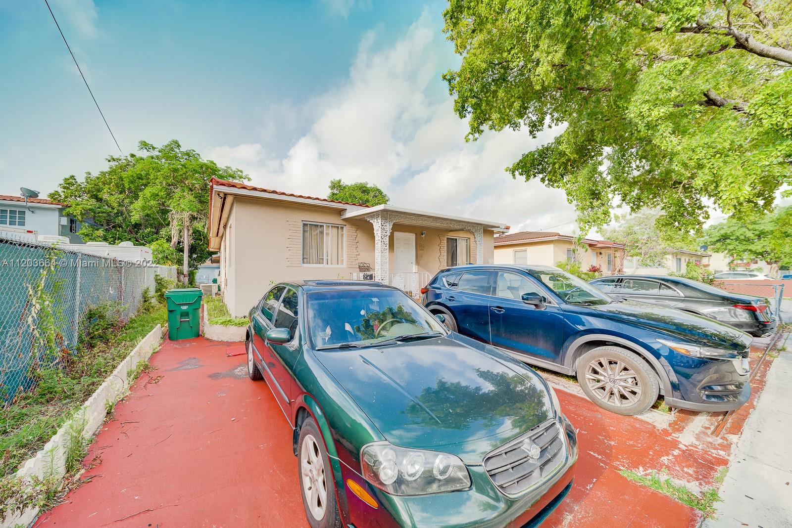 1920 Southwest 4th Street Miami, FL 33135 - Photo 28 of 28 a front view of a house with parking space