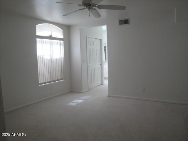 7461 West Matilda Lane Glendale, AZ 85308 - Photo 11 of 18 an empty room that has a mirror