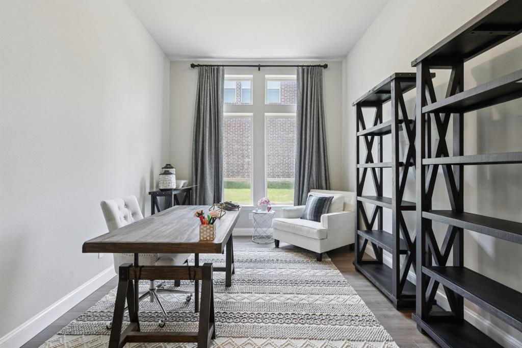 2121 Demarsh Lane Corinth, TX 76210 - Photo 14 of 39 a living room with furniture and a window