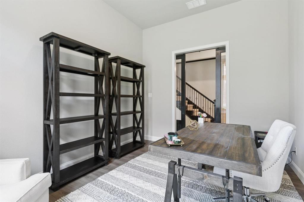 2121 Demarsh Lane Corinth, TX 76210 - Photo 22 of 39 a living room with chairs