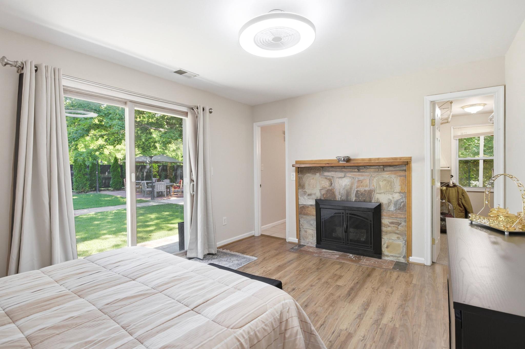11701 Braddock Road Fairfax, VA 22030 - Photo 26 of 70 Second ensuite bedroom with fireplace