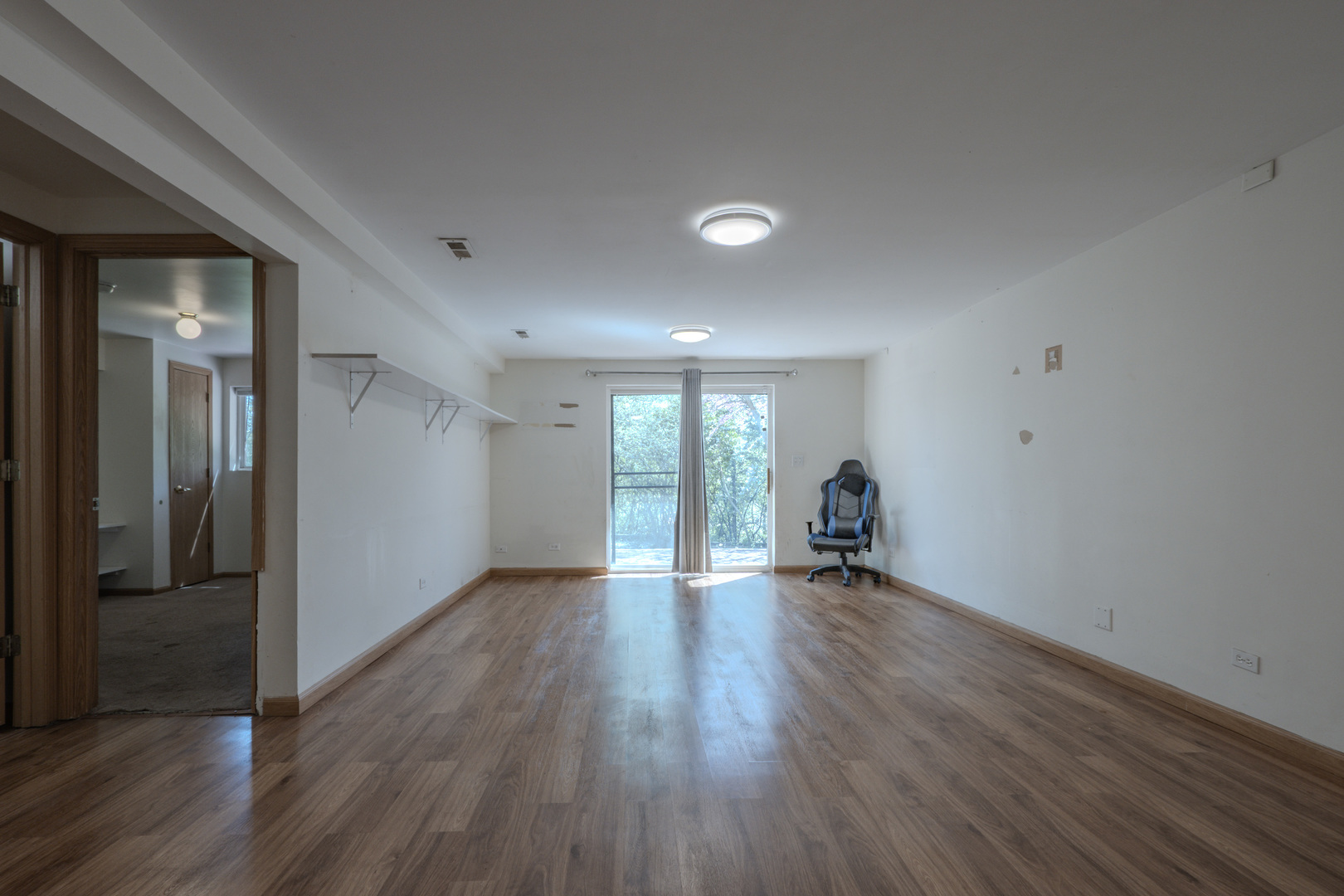 823 Park Bluff Circle Elgin, IL 60120 - Photo 13 of 20 wooden floor in an empty room with a window