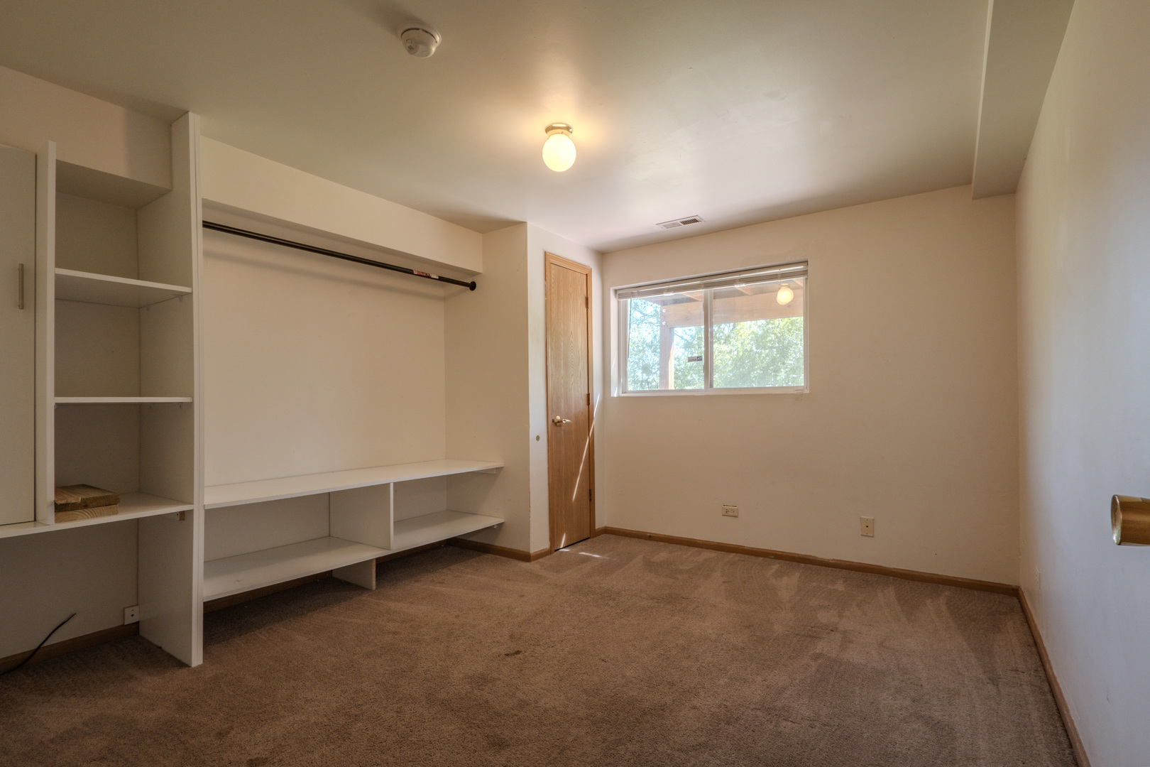 823 Park Bluff Circle Elgin, IL 60120 - Photo 15 of 20 a view of room with window and cabinet