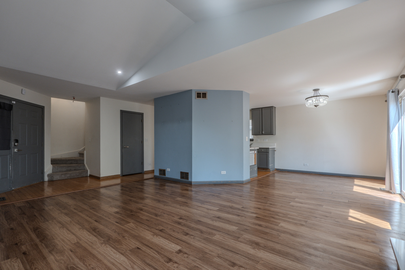 823 Park Bluff Circle Elgin, IL 60120 - Photo 6 of 20 a view of an empty room with wooden floor