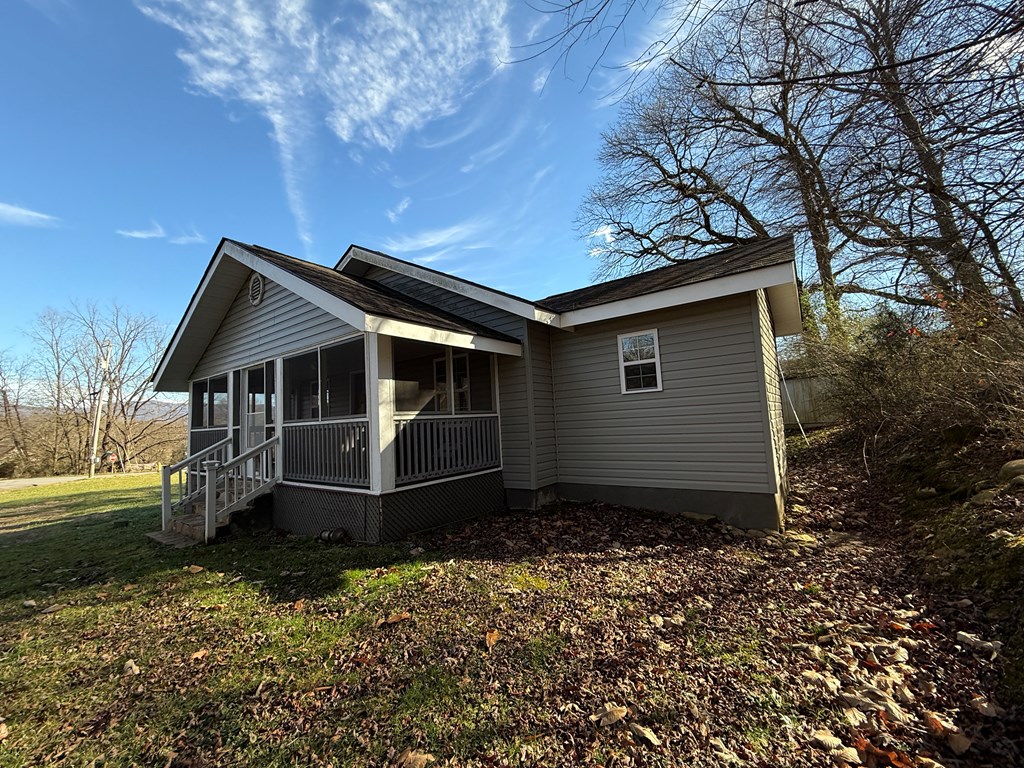 4357 Fairview Road Andrews, NC 28901 - Photo 2 of 25 a house with trees in the background