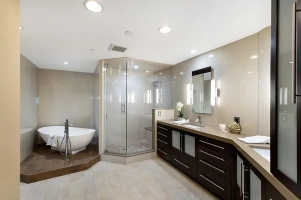 a bathroom with a sink and mirror