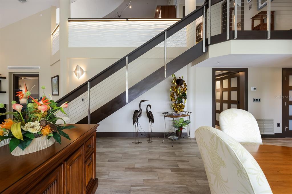 11000 Placida Road, Unit 2203 Placida, FL 33946 - Photo 29 of 64 a view of entryway and hall with wooden floor