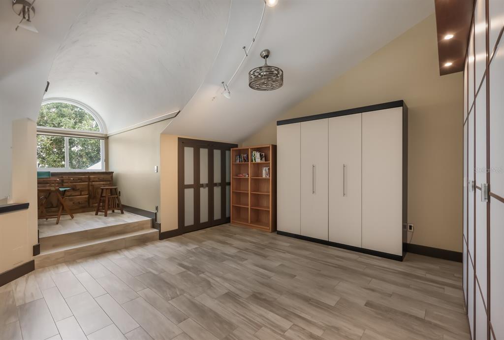 11000 Placida Road, Unit 2203 Placida, FL 33946 - Photo 30 of 64 wooden floor in an empty room with a window