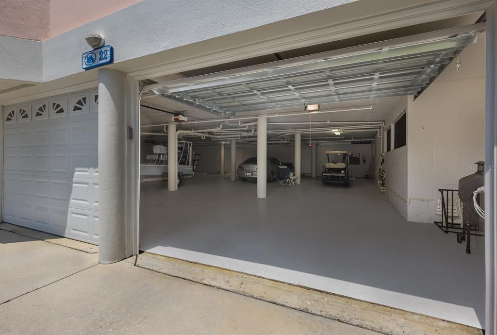 11000 Placida Road, Unit 2203 Placida, FL 33946 - Photo 36 of 64 a view of a hallway with wooden shelves