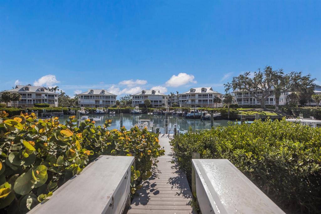 11000 Placida Road, Unit 2203 Placida, FL 33946 - Photo 44 of 64 a view of a lake with sitting area