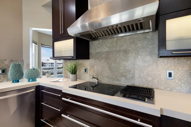 a kitchen with a sink and a microwave