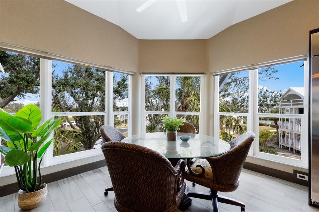 11000 Placida Road, Unit 2203 Placida, FL 33946 - Photo 8 of 64 a dining room with furniture window and outdoor view