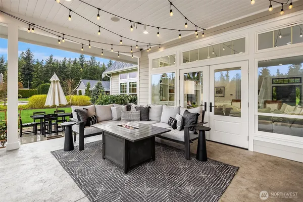 a outdoor space with patio couch and a table