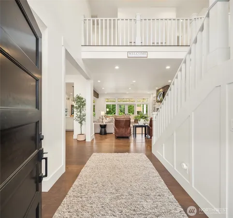 a living room with furniture and a rug