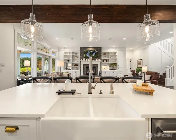 a large kitchen with a table and chairs