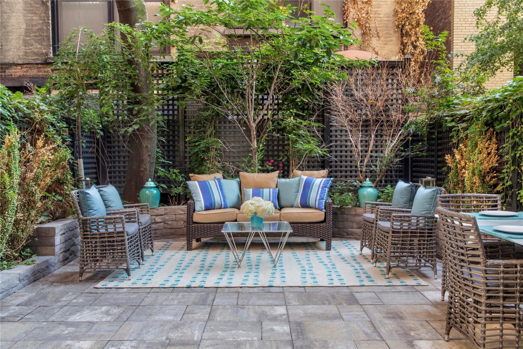 a view of backyard with outdoor seating