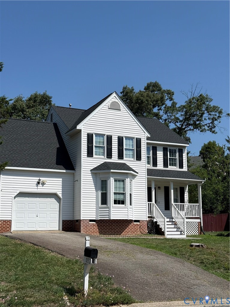 10912 Point Grey Road Henrico, VA 23233 - Photo 1 of 3 Two-story residence featuring white siding, a dark