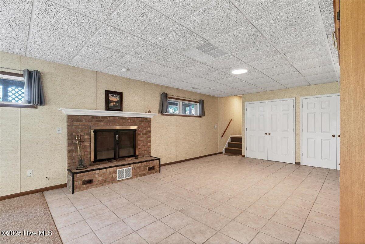 120 Shagbark Road West End, NC 27376 - Photo 40 of 76 Lower Level with fireplace