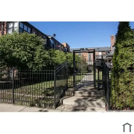 a view of a backyard with a garden