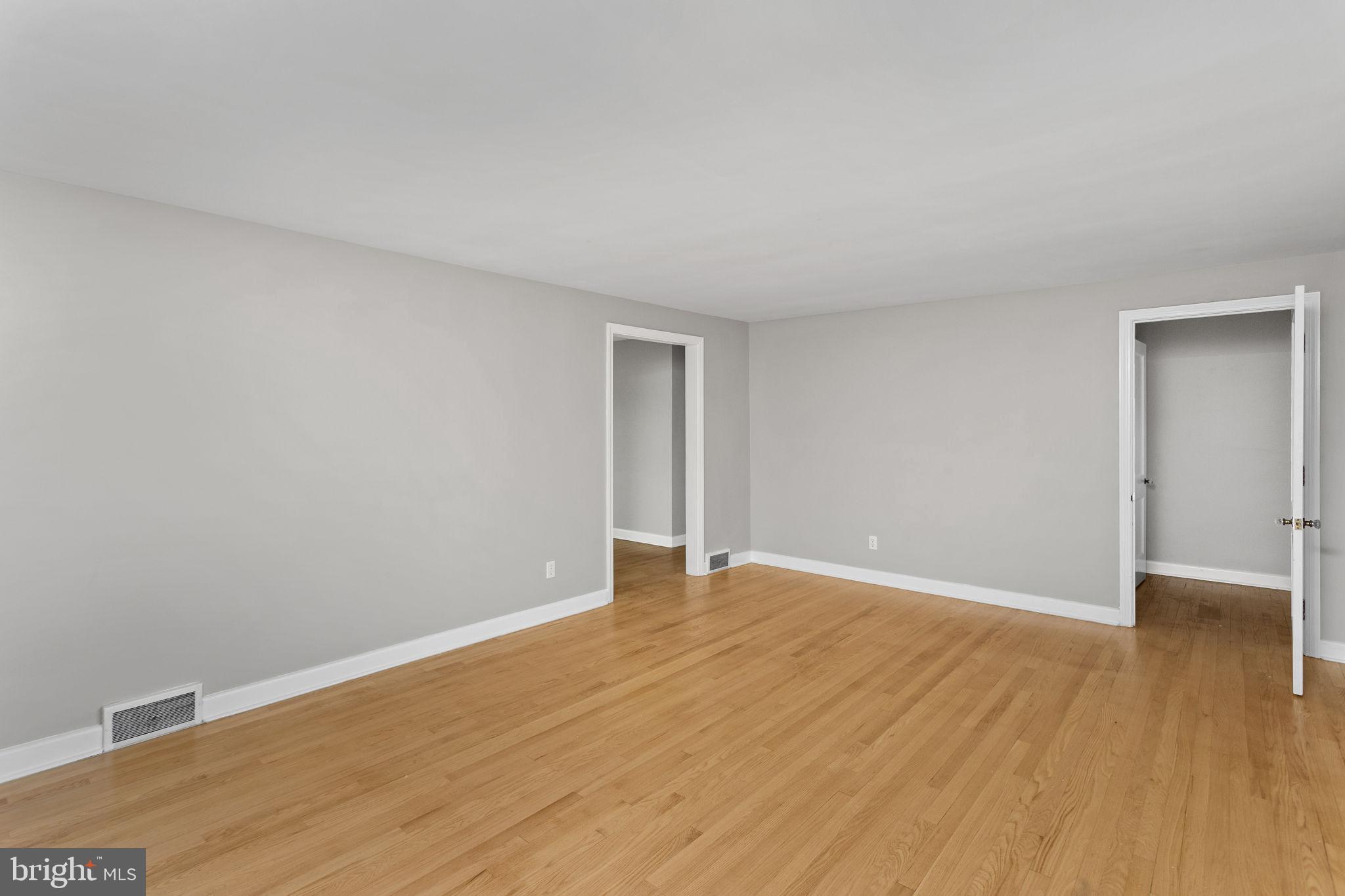 81 Wittenborn Avenue Hamilton, NJ 08619 - Photo 20 of 24 a view of an empty room with wooden floor