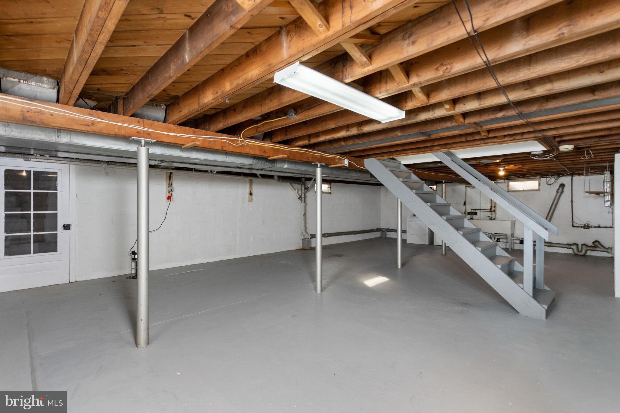 81 Wittenborn Avenue Hamilton, NJ 08619 - Photo 22 of 24 a view of an empty room with stairs
