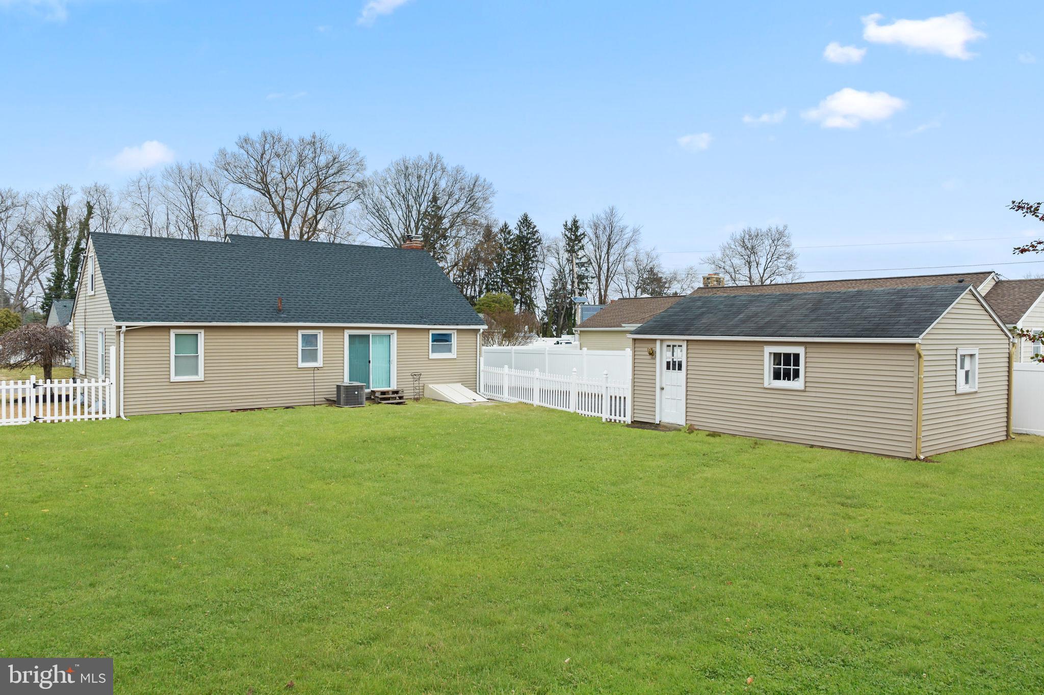 81 Wittenborn Avenue Hamilton, NJ 08619 - Photo 4 of 24 a front view of house with yard and trees