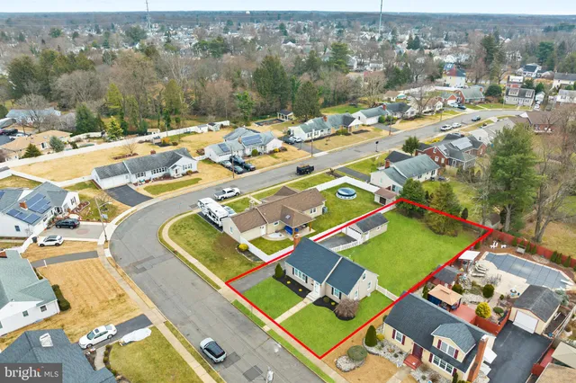 an aerial view of a pool patio patio and outdoor view